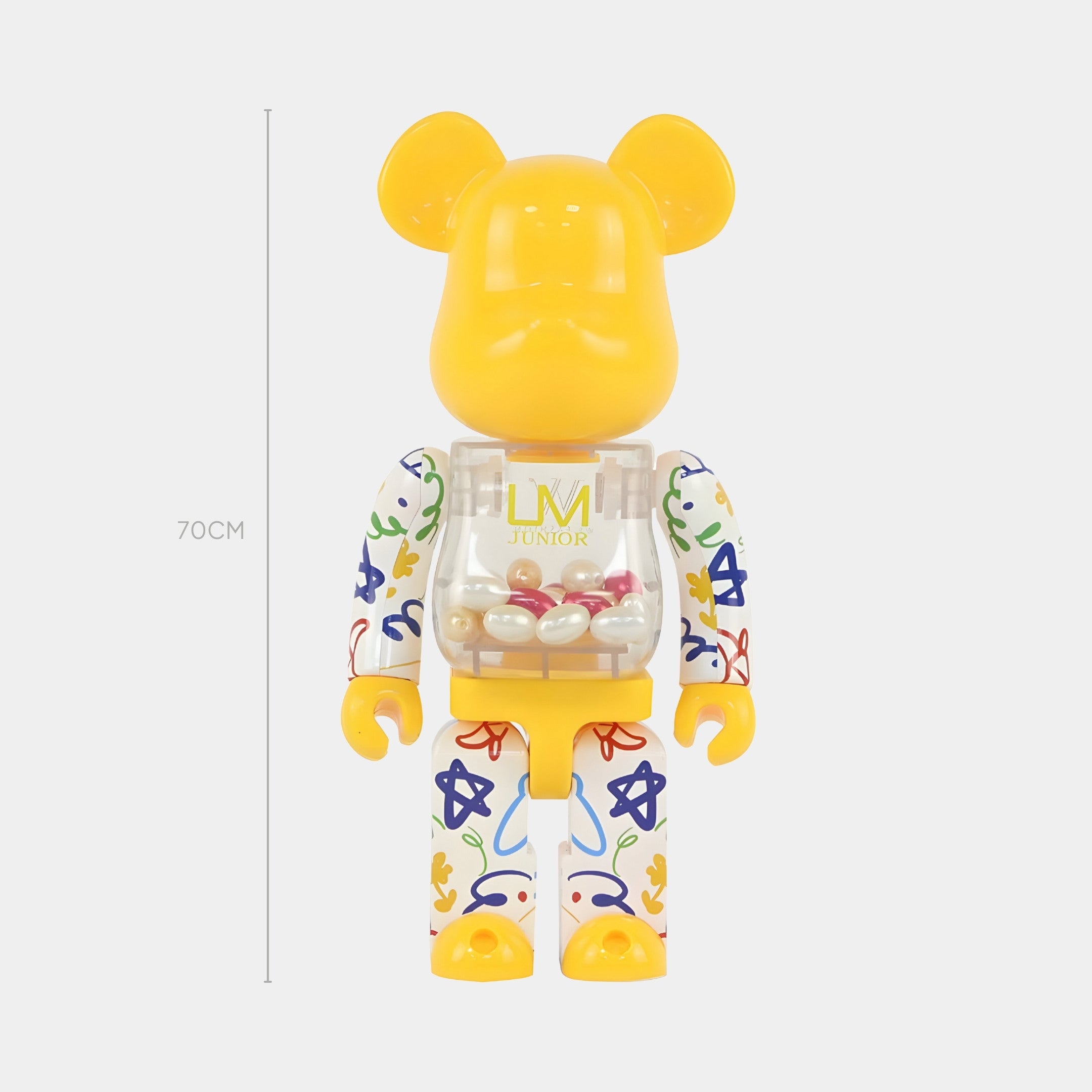 The Yellow Candy Doodle Bear Sculpture - 70cm by Giant Sculptures features colorful abstract patterns, a transparent capsule-filled chest, and a Sunshine Yellow Gloss finish, set against a plain light background.