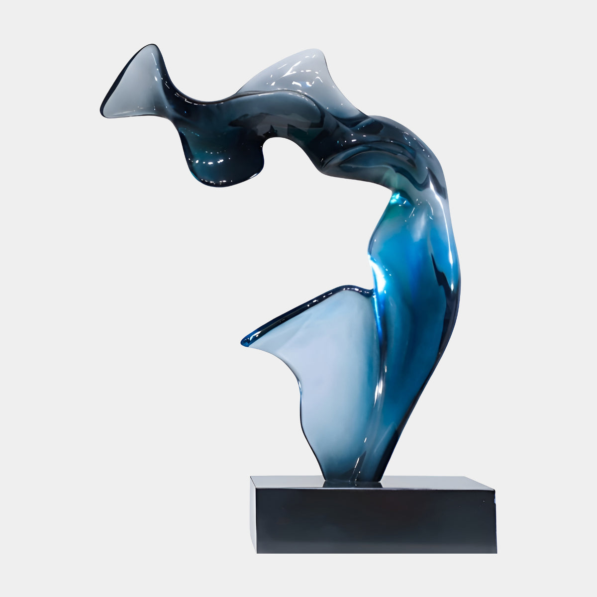 Dark Blue Arched Abstract Resin Sculpture (97cm) with glossy curved form and flared fin edges, mounted on a black marble base against a plain white background.