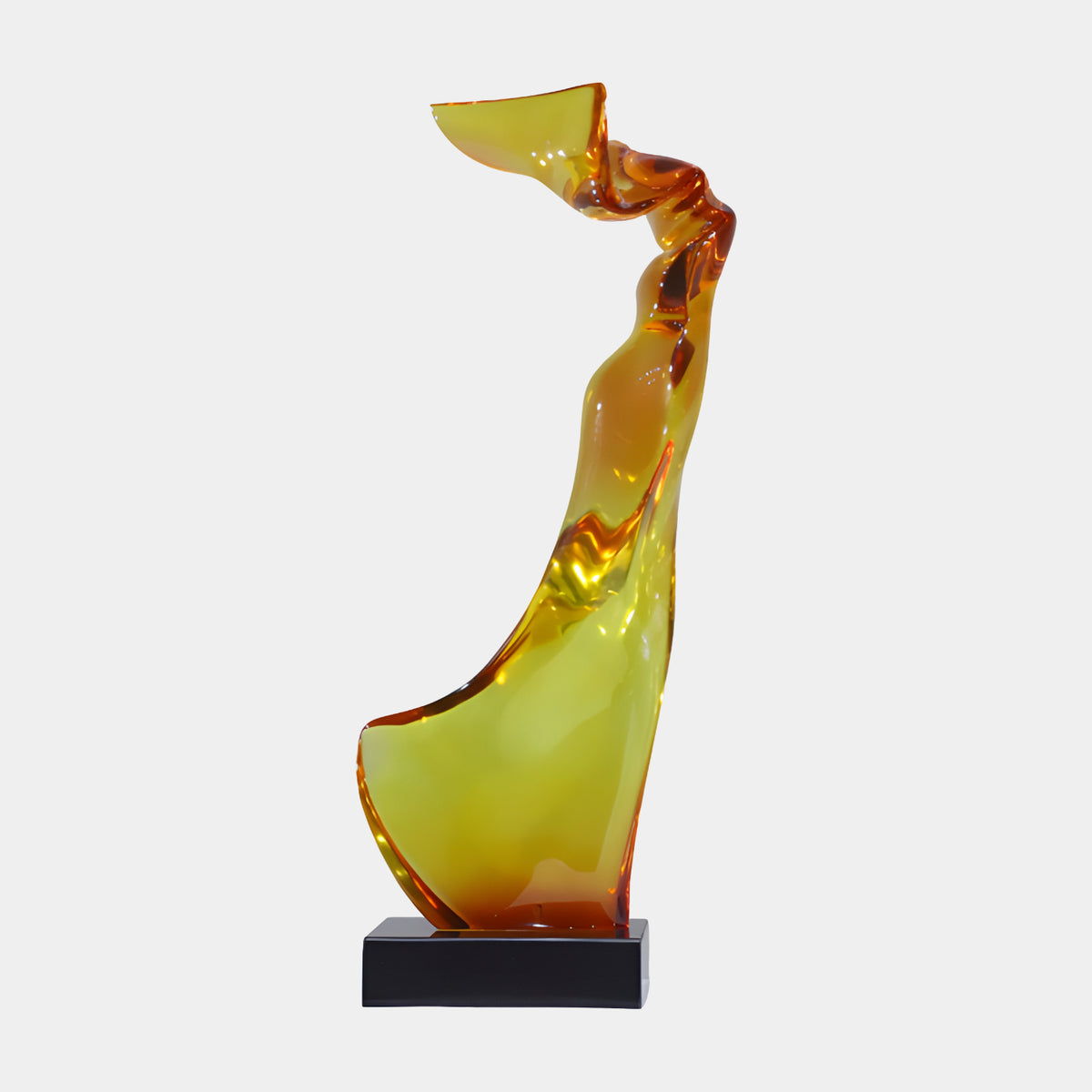 Amber Draped Figure Resin Sculpture, 85cm, honey-yellow resin deepening to orange at the folds and crown, on a black marble base, plain white background.
