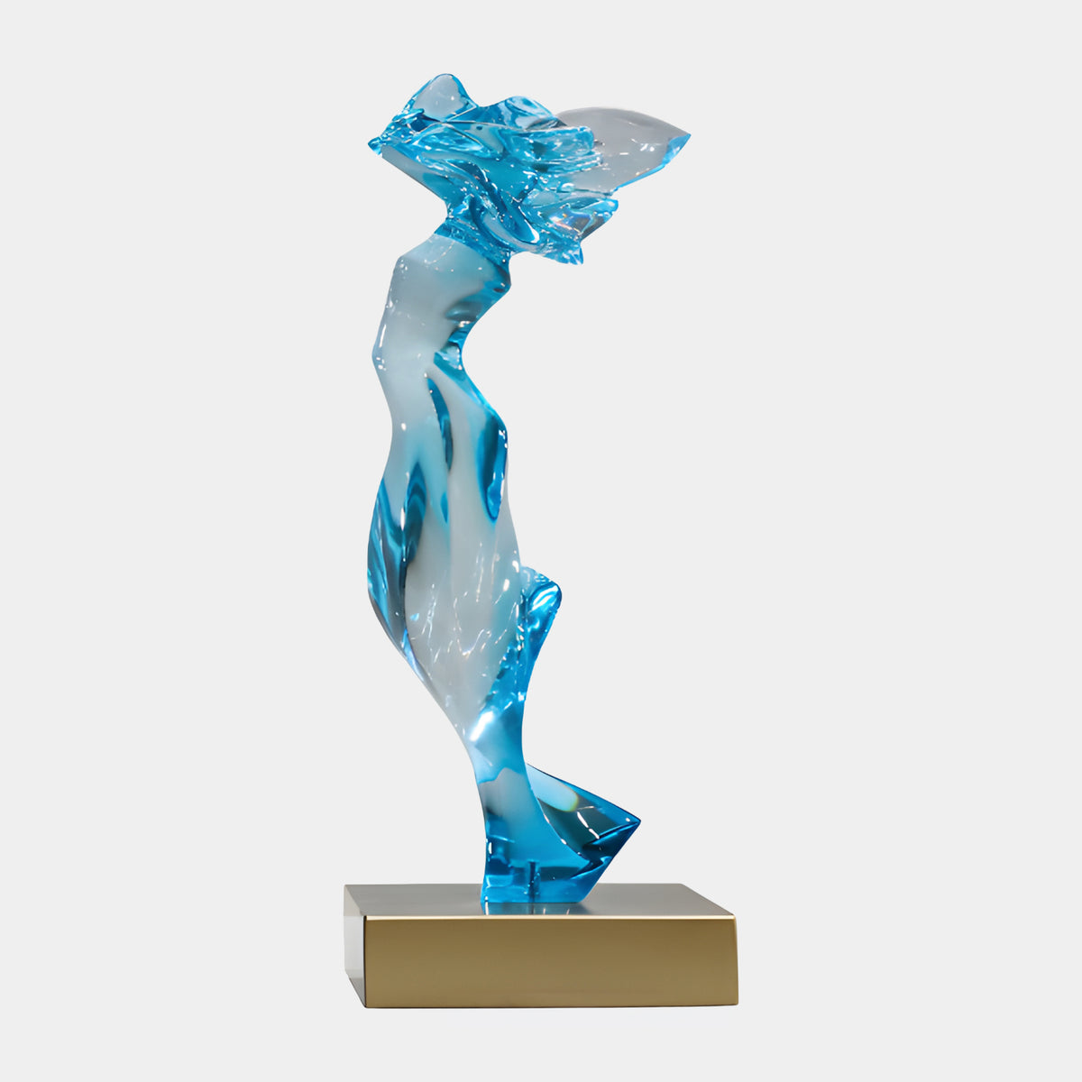 Sky Blue Windblown Figure Resin Sculpture - 62cm, a slender windswept figure in sky blue and clear resin on a gold-finished block, shown against a plain light background.