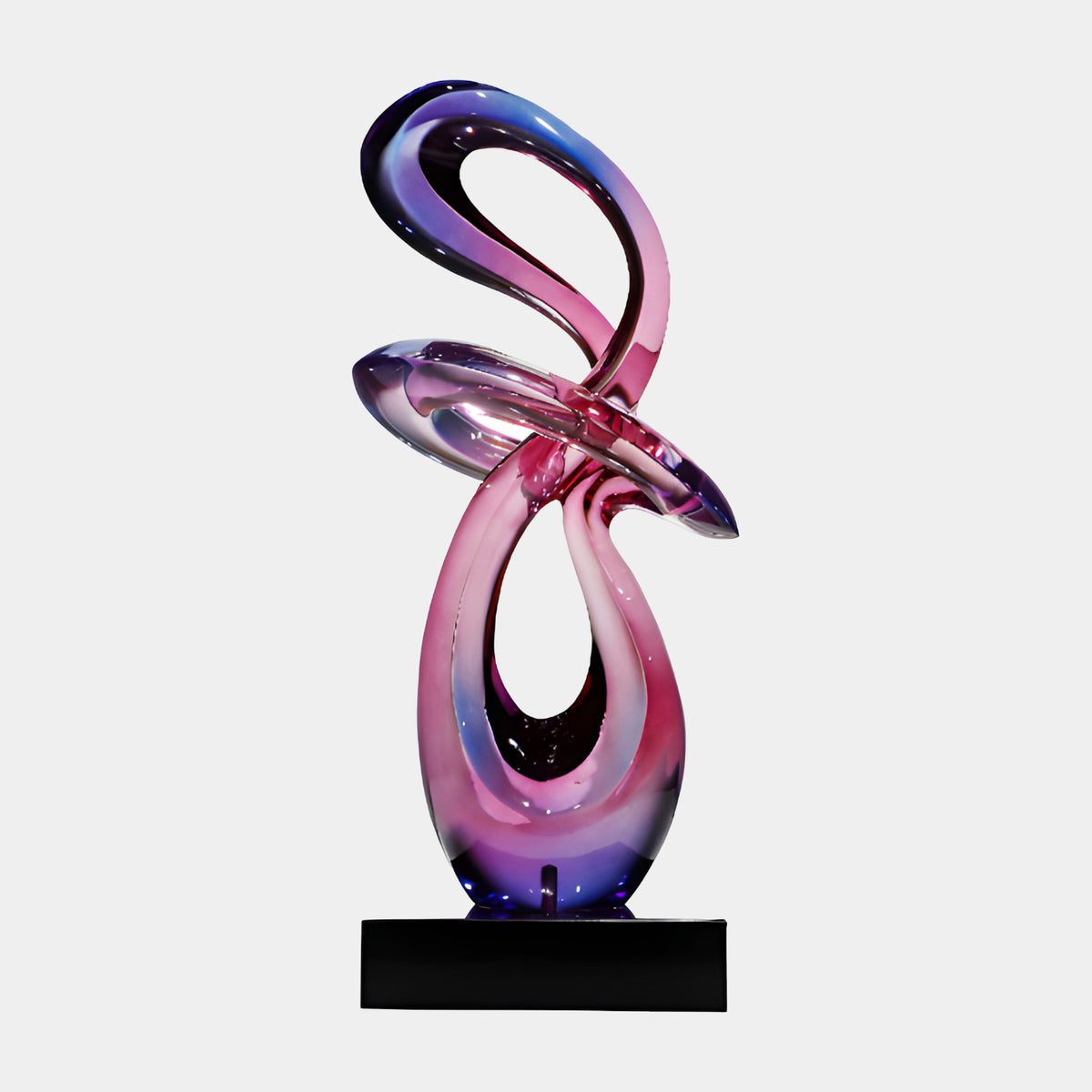 Pink to Blue Looped Ribbon Knot Resin Sculpture, 80cm, with violet-blue upper loops and pink-to-magenta lower curves, on a black marble base, against a plain light background.