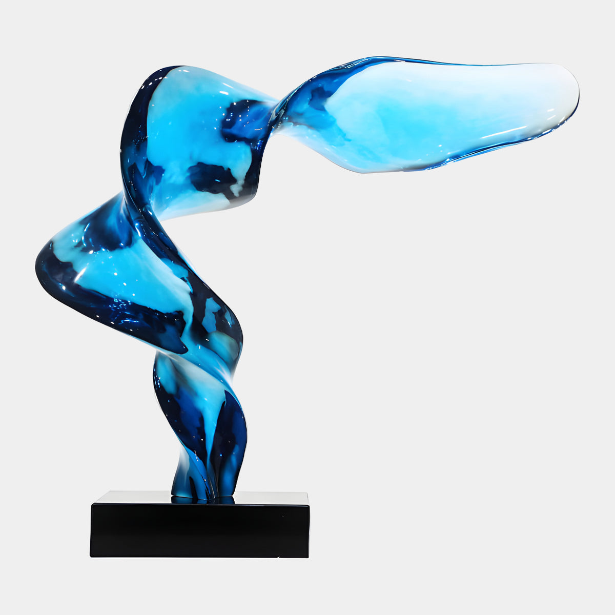 Cobalt & Aqua Cantilevered Ribbon Resin Sculpture, 72cm, twisting upward from a black marble base with one arm thrown sideways, on a plain white background.
