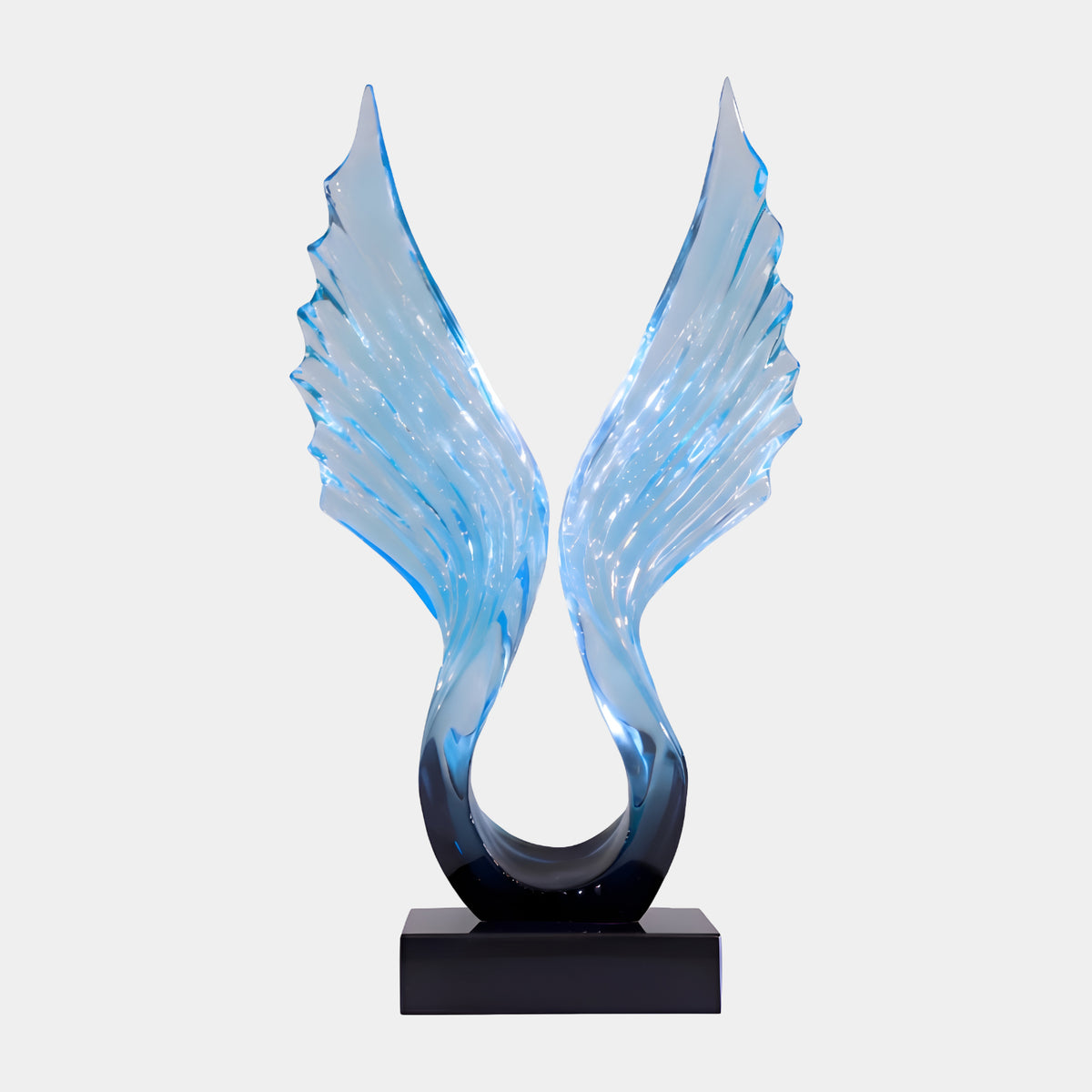 Blue Feathered Wings Resin Sculpture (86cm) on black marble base, wings rising from navy root to pale sky-blue tips, shown against a plain white background.