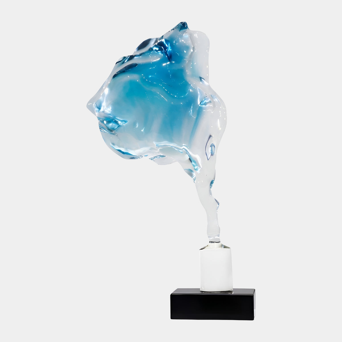 Blue & Clear Bloom on a Stem Resin Sculpture, 73cm, blue-centered petal form clearing to glassy edges on a white collar and black block base, plain background.