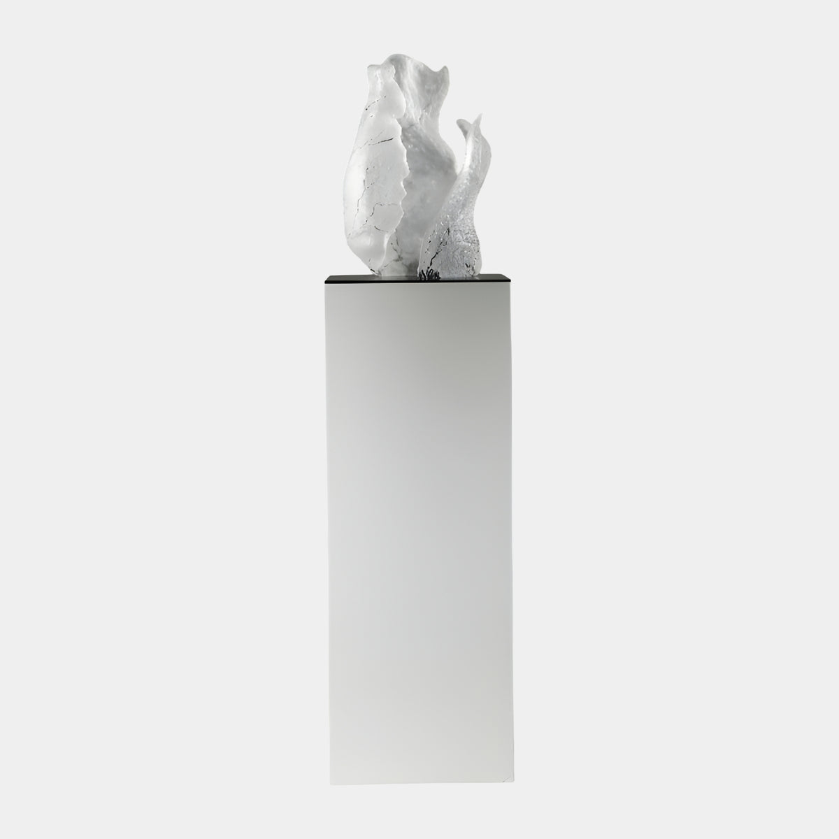 White Cracked Form Resin Sculpture, 150cm, white abstract furled shape with ridged texture on a black metal plate atop a tall pale plinth, white background.
