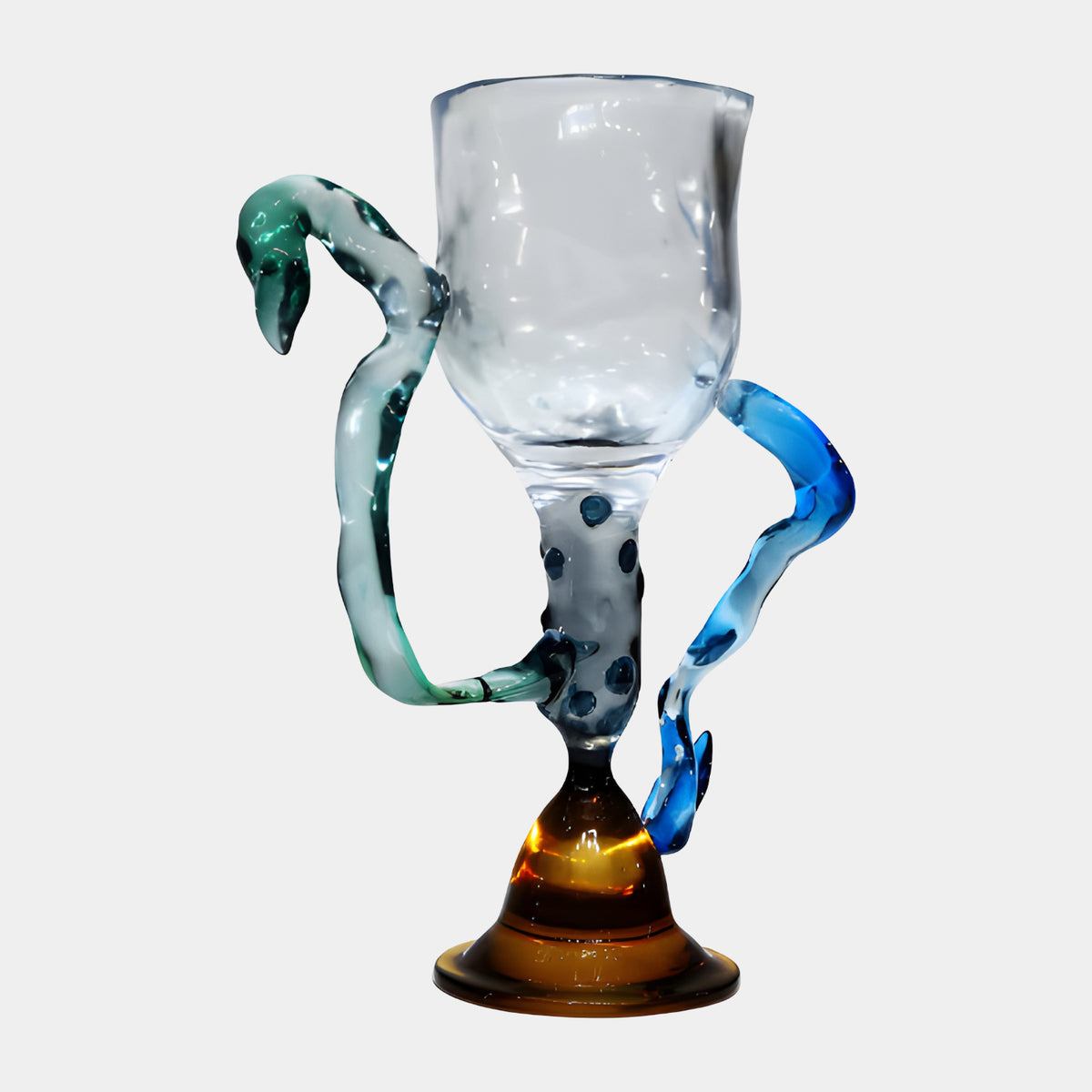 Multicoloured Tendril Goblet Resin Sculpture, 40cm, with clear spotted cup, amber foot, and green and blue tendril handles, shown on a plain white background.