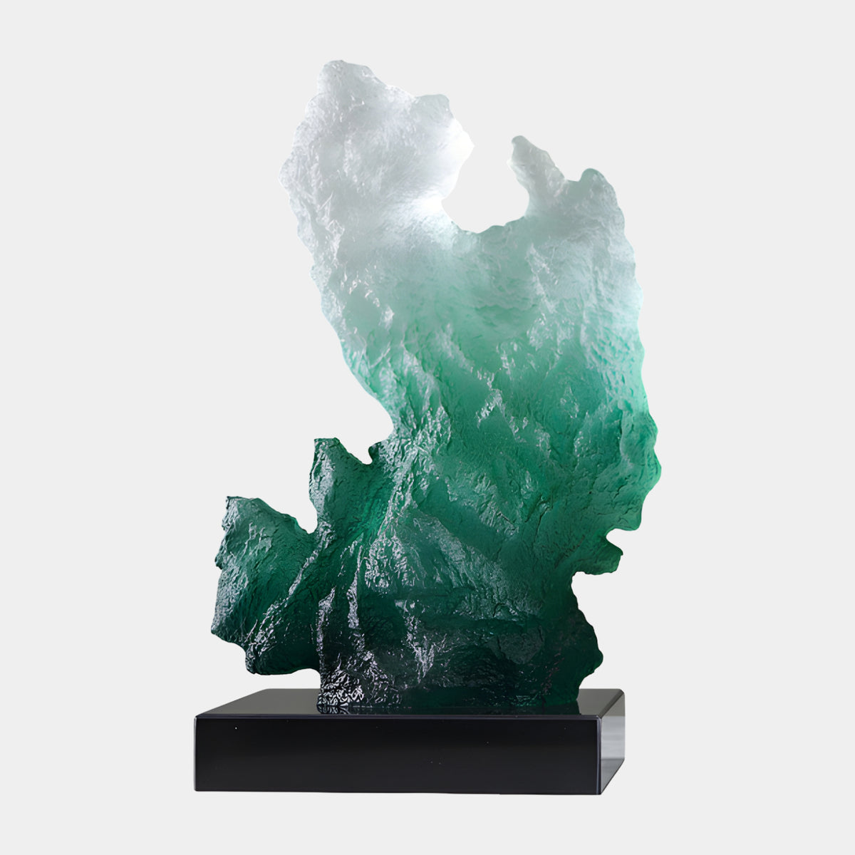 Green & White Rock Face Resin Sculpture, 49cm, jagged textured form fading from deep green to white, on a black base, set against a plain light background.