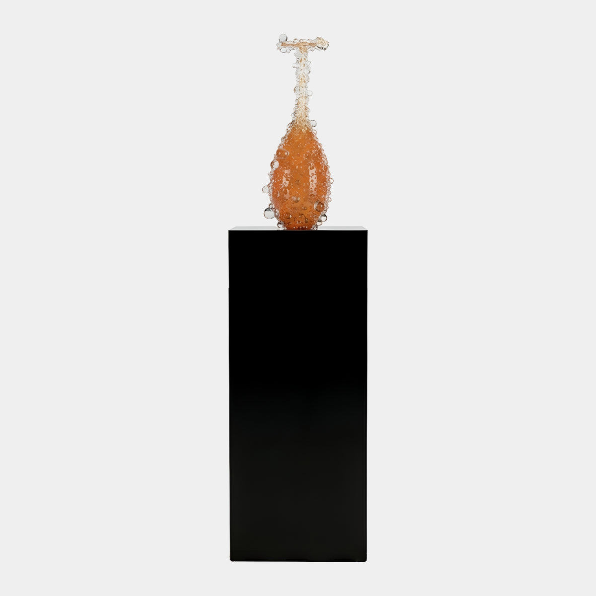 Amber Beaded Bottle Form Sculpture on a tall black marble plinth, 177cm, teardrop body crusted with clear beads, set against a plain white background.
