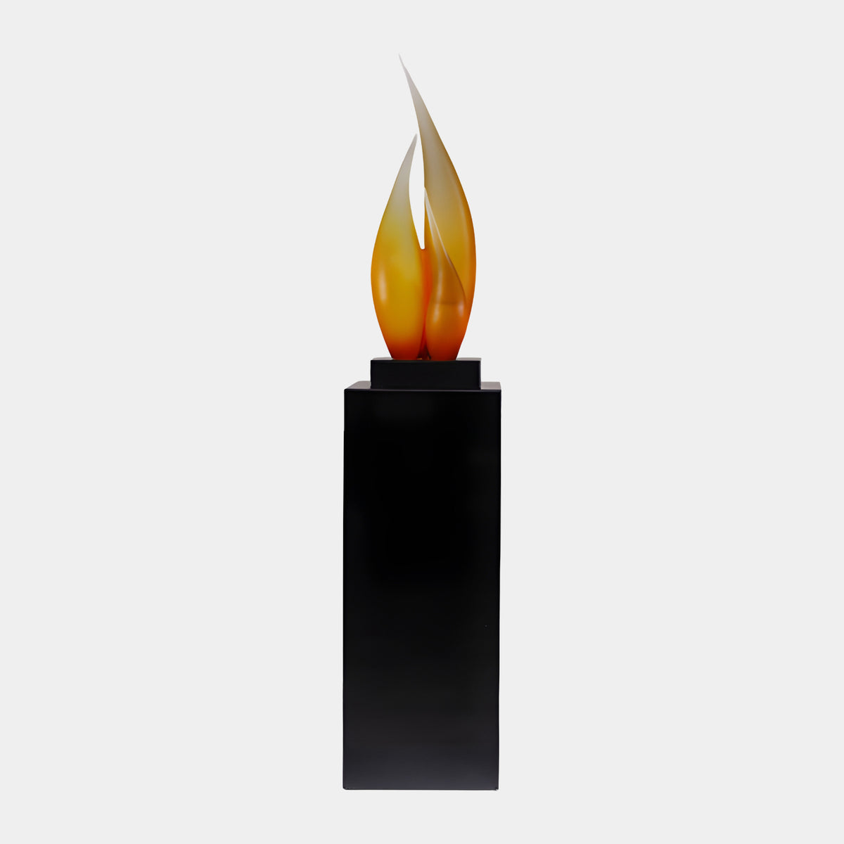Orange Twin Leaf Flame Resin Sculpture, 162cm, amber-to-cream flame-shaped leaves on a black plate atop a tall black pedestal, plain white background.