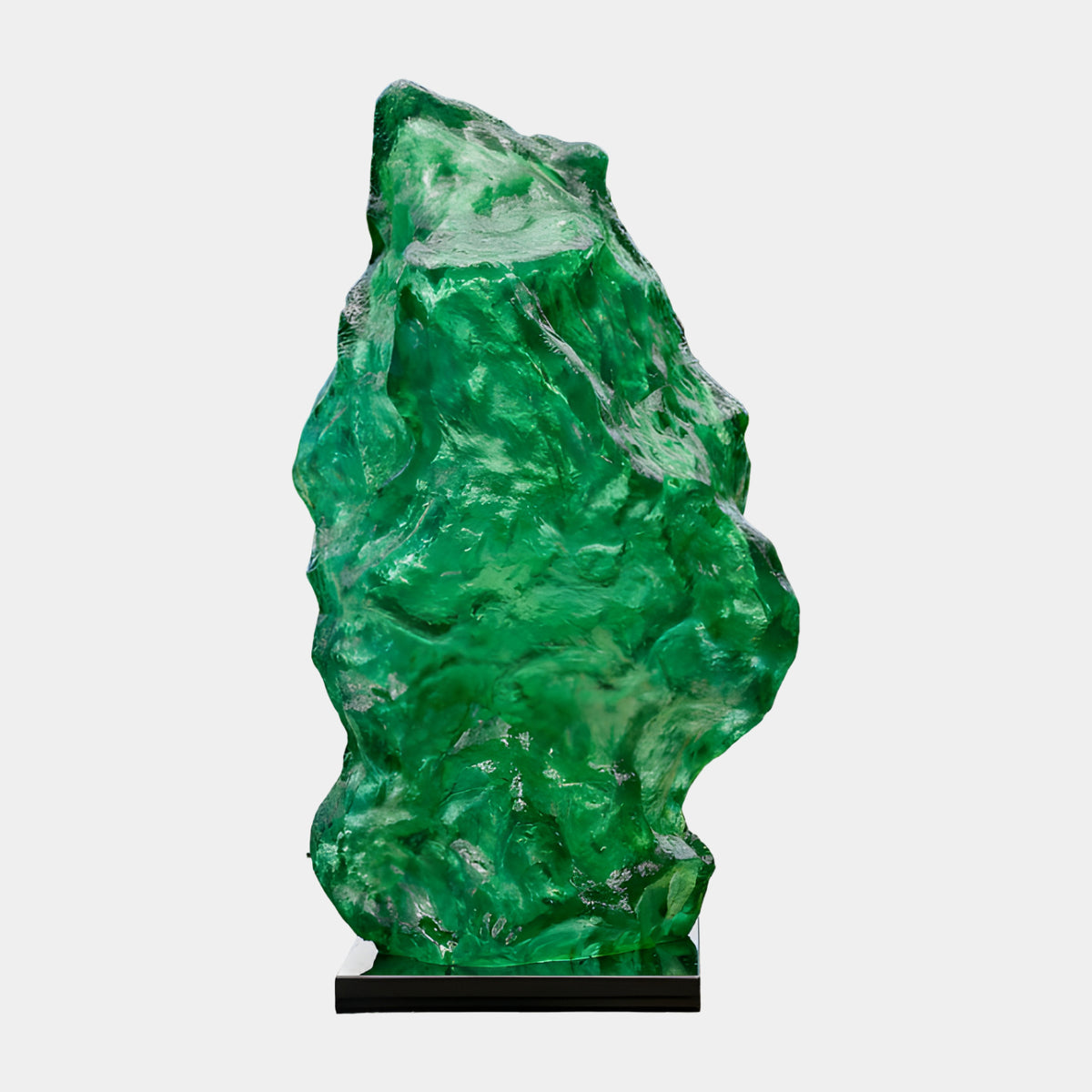 Green Eroded Boulder Resin Sculpture, 135cm, with textured emerald-green worked surface on a thin black base, set against a plain light background.
