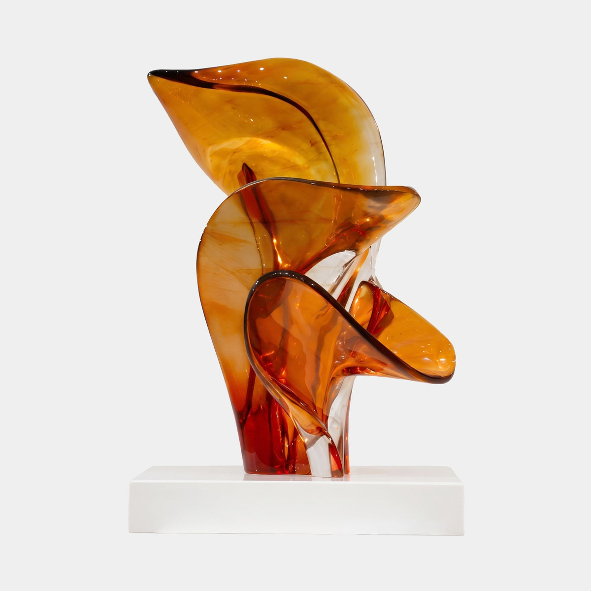 Orange & Red Curling Petal Resin Sculpture, 60cm, with three amber-to-red petals rising from a white marble base, set against a plain light background.