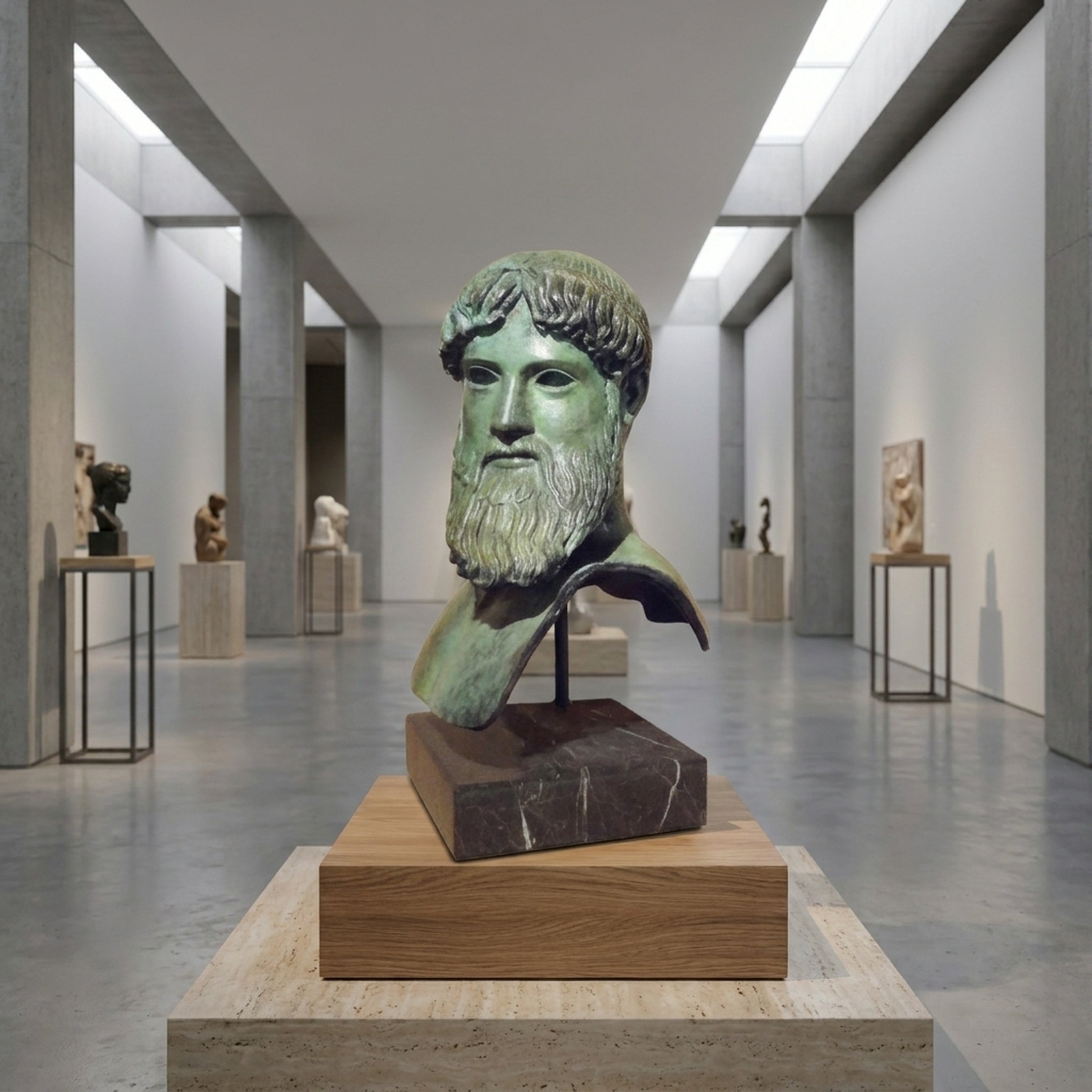 Classical Bearded Male Bust by Giant Sculptures in verdigris bronze on a dark marble plinth, displayed in a gallery with sculptures along the walls.