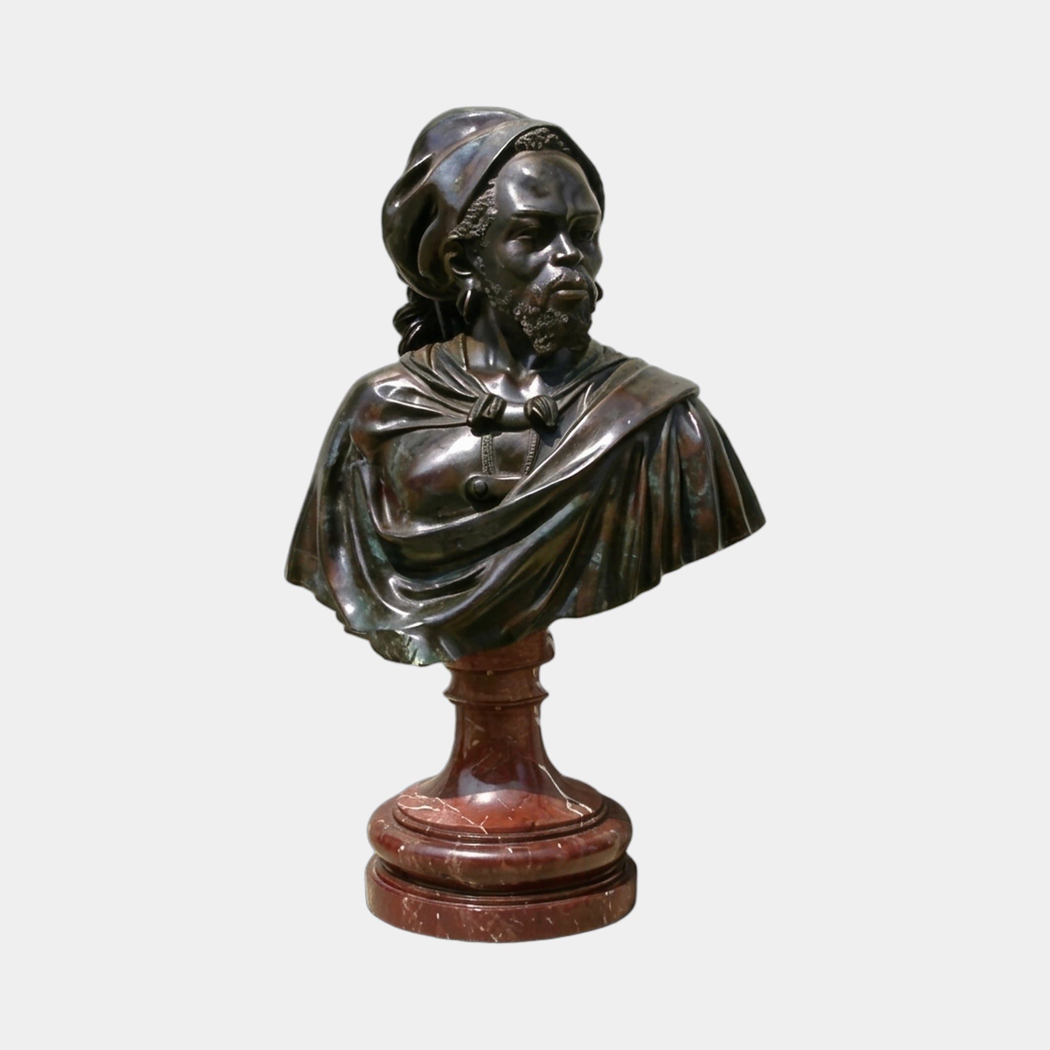 Classical Bearded Man Bust Bronze Bust 75cm by Giant Sculptures, dark patinated figure in headwrap and draped cloak on a turned rouge marble pedestal.