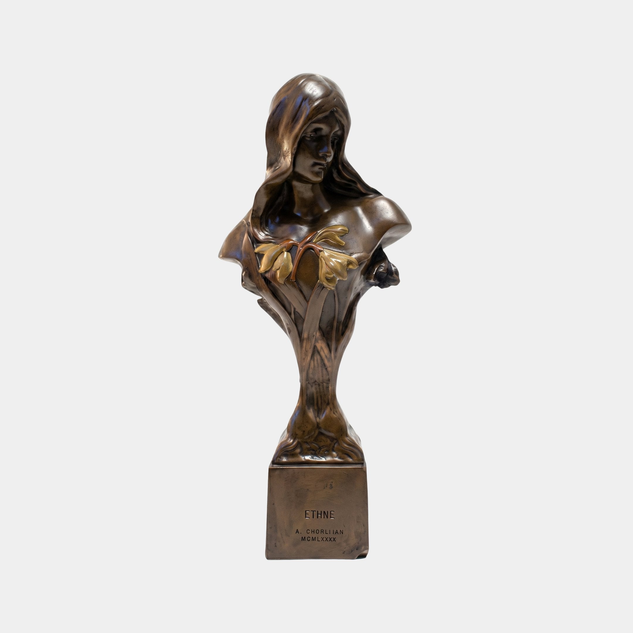 Classical Female Bust Bronze Bust, 75cm, dark-patinated Art Nouveau figure "Ethne" with flowing hair, gilt floral accent, and integral pedestal, shown against a plain white background.