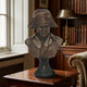 Classical Military Bust Bronze Bust 60cm by Giant Sculptures, bicorne-hatted figure with warm brown patina on a dark pedestal, displayed on a side table in a panelled library.