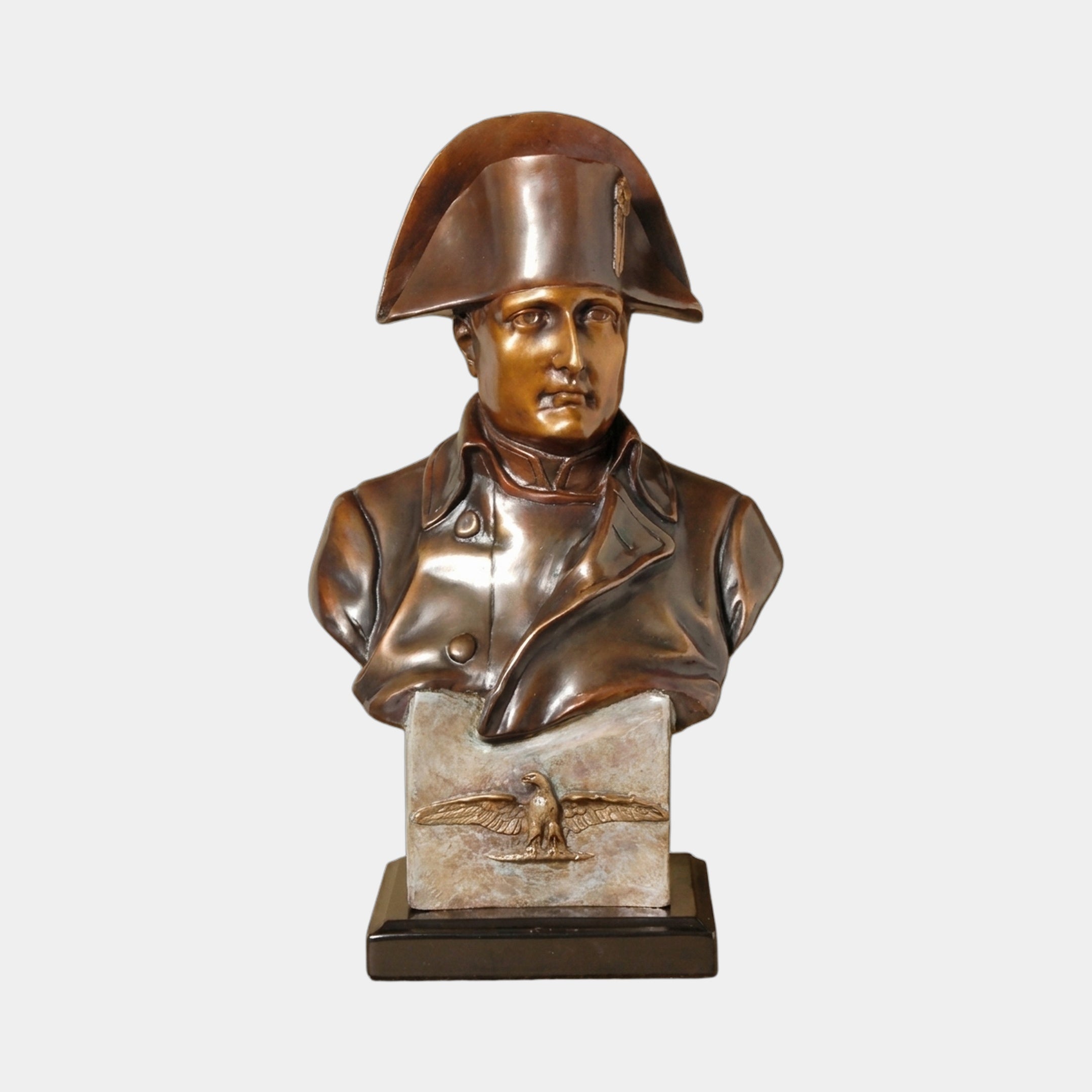 Classical Napoleon Bonaparte Military Bronze Bust by Giant Sculptures, shown in three-quarter view with bicorne hat, dual-tone patina, eagle relief plinth and dark base.