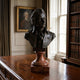 Giant Sculptures Classical Portrait Bust Bronze 60cm of Mozart on a reddish marble pedestal, displayed on a wooden cabinet in a library with a portrait painting.