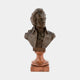 Classical Portrait Bust Bronze Bust 60cm by Giant Sculptures, depicting Mozart in three-quarter profile with dark patina, on a reddish-orange marble pedestal.