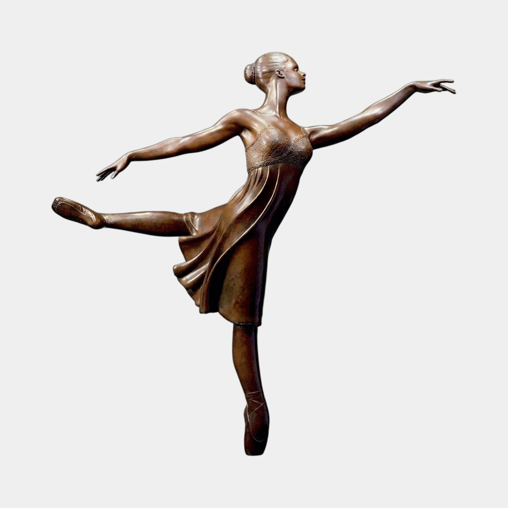 Contemporary Ballerina en Pointe Bronze Sculpture by Giant Sculptures, shown in profile with one leg extended forward and both arms spread wide, against a plain background.