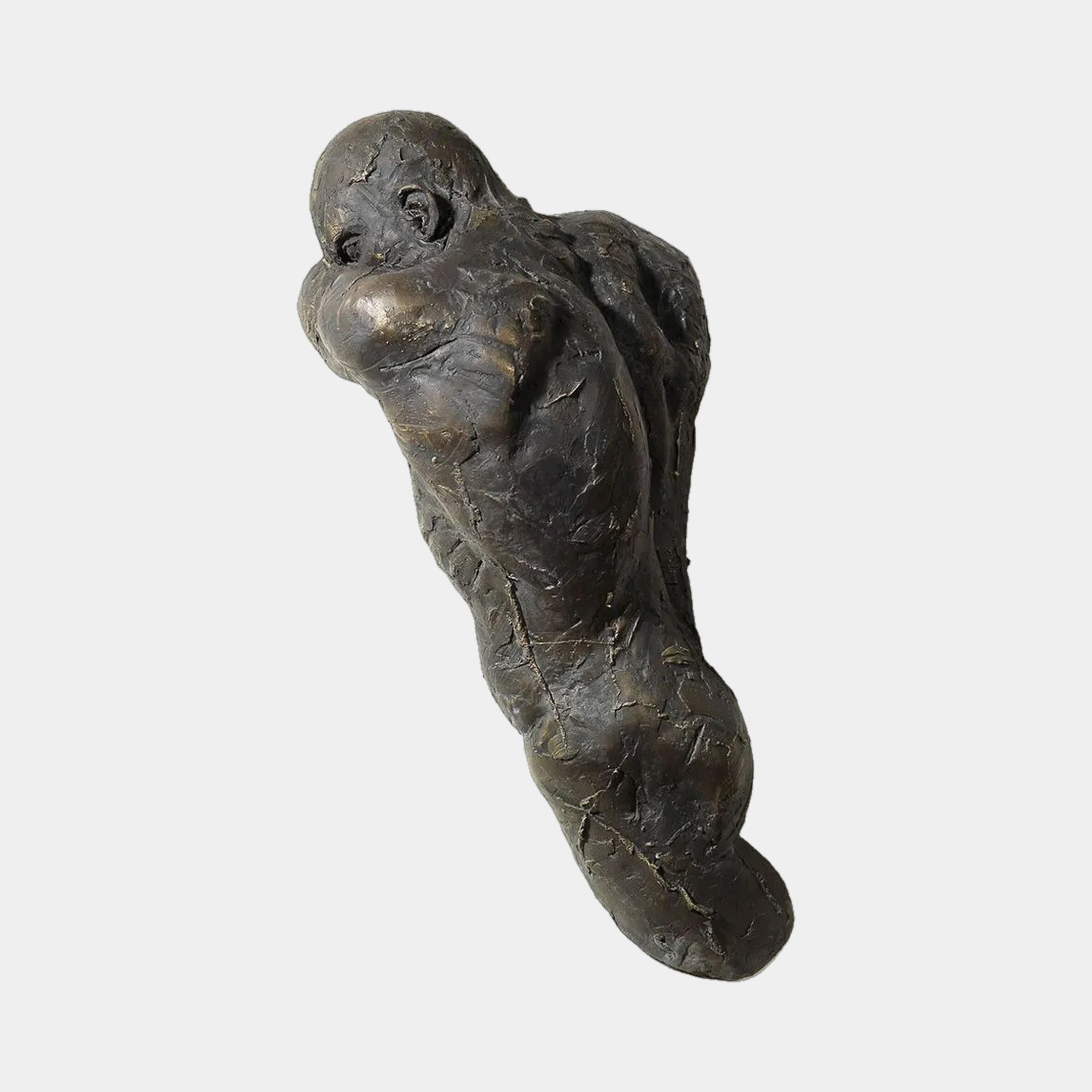 Giant Sculptures Contemporary Emerging Male Figure Bronze Relief 70cm shown at an angle, dark patina figure twisting from the surface against a plain background.