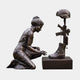 Giant Sculptures Contemporary Kneeling Woman and Battlefield Cross Memorial Bronze Sculpture 120cm, side view with dark patina, on a plain background.