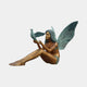 Contemporary Seated Fairy Girl with Dove Bronze Sculpture by Giant Sculptures, seated nude figure with verdigris wings holding a dove, on a plain background.