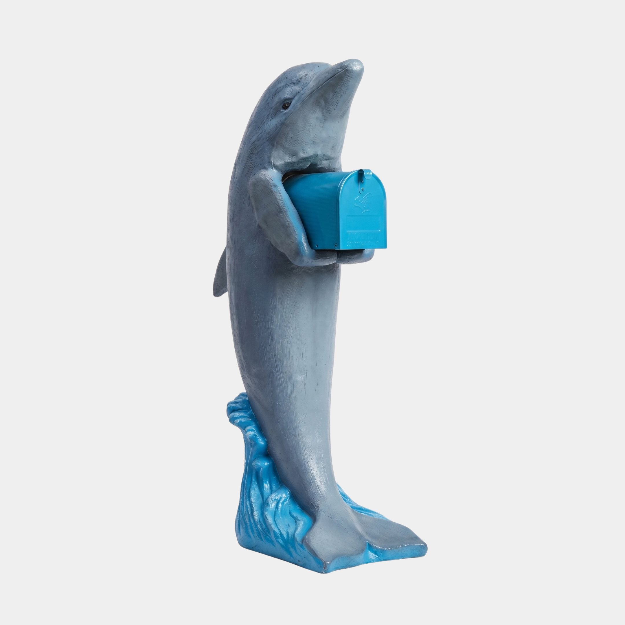 Contemporary Upright Dolphin and Mailbox Bronze Sculpture by Giant Sculptures in blue-grey finish, cradling a cobalt mailbox on a wave base, side view.