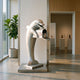 Contemporary Upright Dolphin Bronze Sculpture by Giant Sculptures in silver-grey finish with integrated mailbox, displayed indoors beside a fiddle-leaf fig.