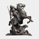 Giant Sculptures 260cm bronze sculpture of an armoured knight on a rearing horse driving a lance into a coiled dragon, dark patina, plain background.