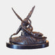 Large Classical Cupid and Psyche Bronze Sculpture by Giant Sculptures, winged Cupid embracing reclining Psyche, dark patina on oval marble base.