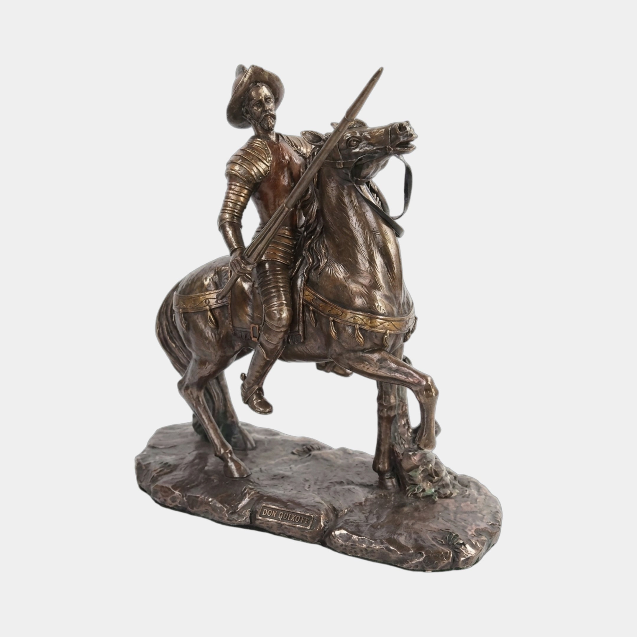 Large Classical Don Quixote on Rearing Horse Bronze Sculpture by Giant Sculptures, armoured knight with lance astride a rearing horse on an inscribed base.