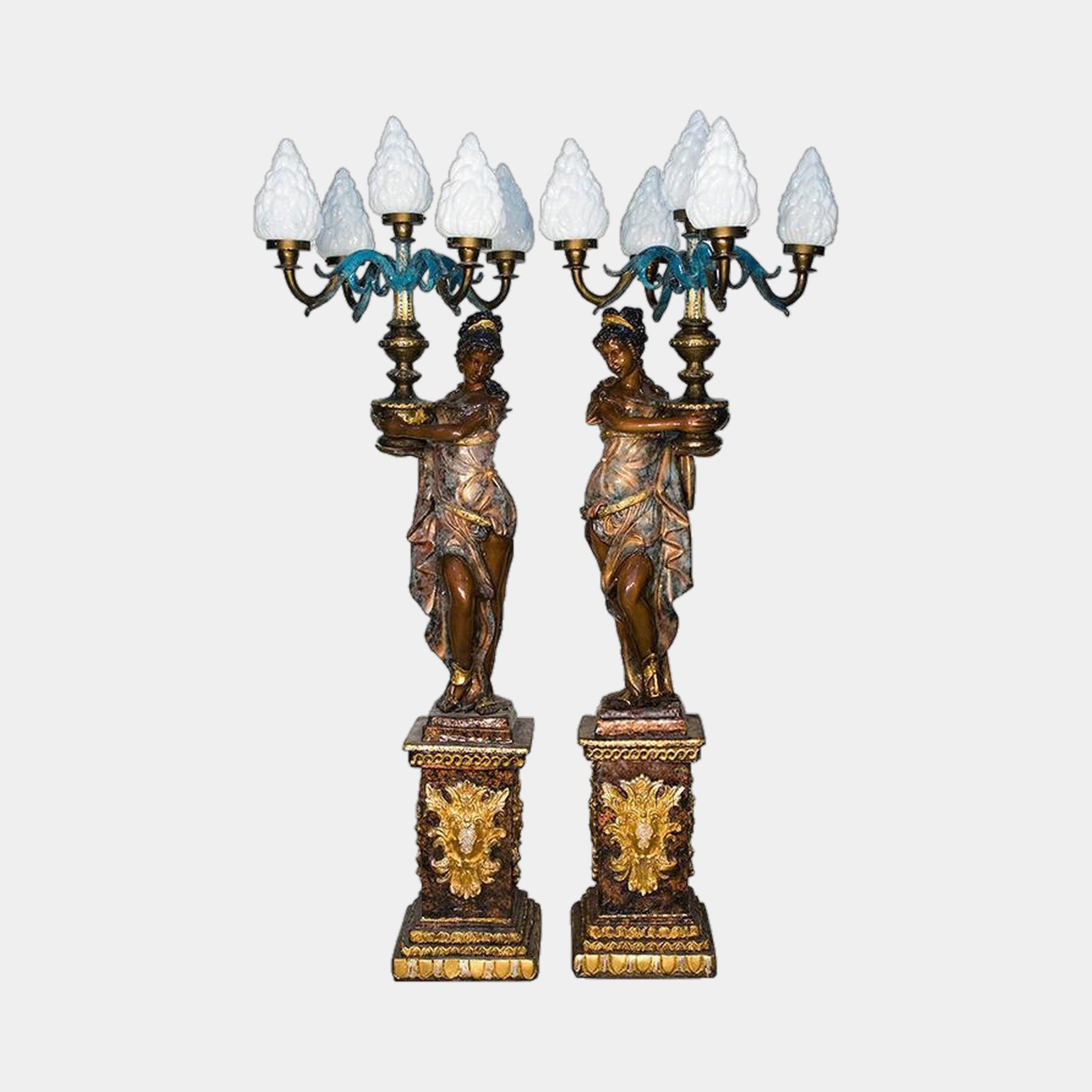 Pair of 210cm Large Classical Draped Female Figure Candelabra Bronze Sculptures by Giant Sculptures, with teal arms, frosted flame shades, and gilded pedestals.