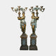 Pair of 180cm Large Classical Draped Goddess Candelabra Bronze Sculptures by Giant Sculptures, verdigris and gold finish, on ornate pedestals, plain background.