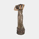 Large Classical Female Figure Bronze Fountain by Giant Sculptures, 190cm draped woman lifting a tilted urn overhead on a rocky base, warm brown patina.