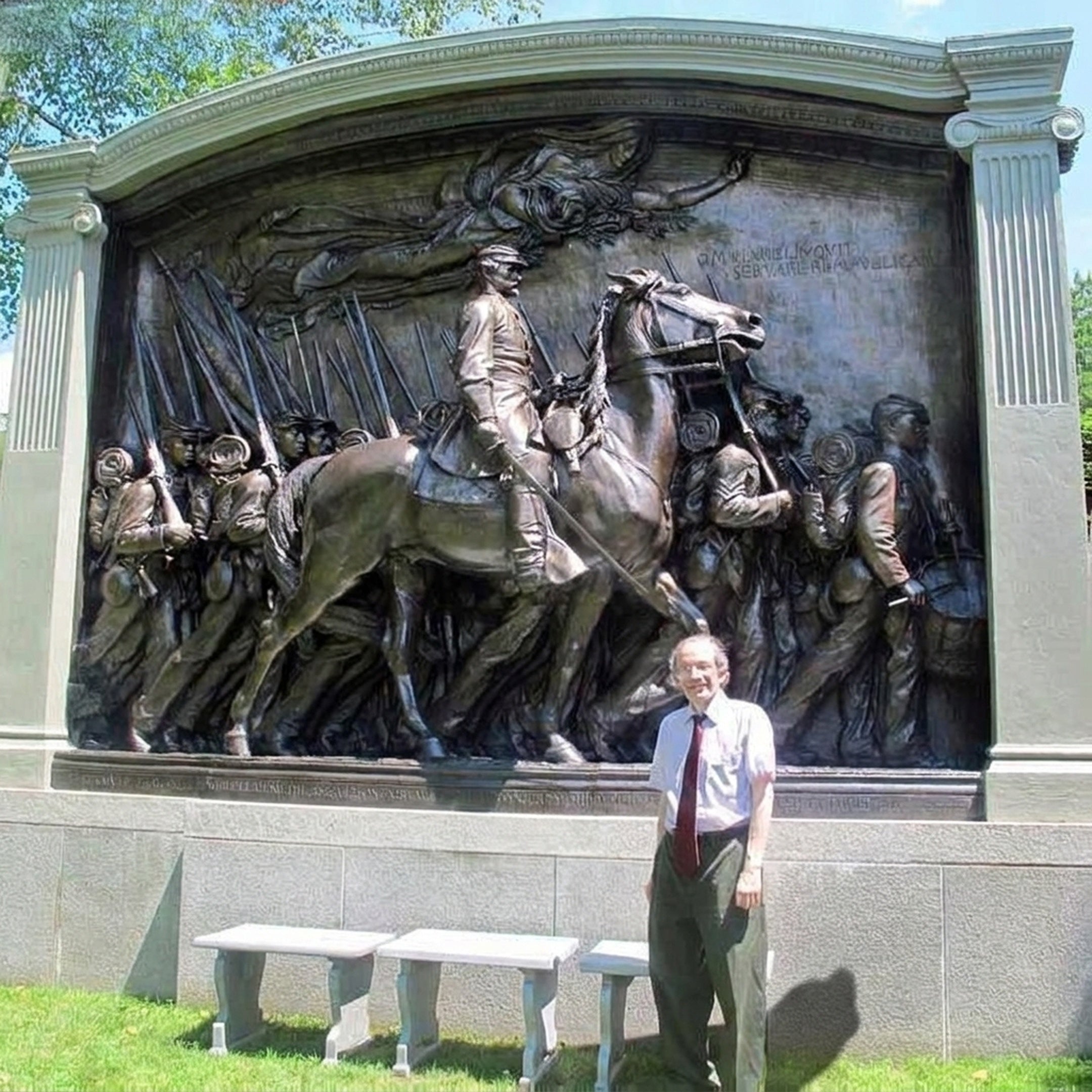 Giant Sculptures Large Classical Mounted Officer and Infantry Bronze Relief at 200cm, with a man standing beside it for scale before the framed processional panel.