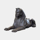 Large Classical Recumbent Egyptian Sphinx Bronze Sculpture by Giant Sculptures, 180cm, dark patina with nemes headdress and hieroglyphic chest panel, plain background.
