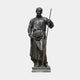 Large Classical Robed Saint Bronze Sculpture, 220cm, depicting a robed male figure holding a tall staff, on a stone base against a plain light background.