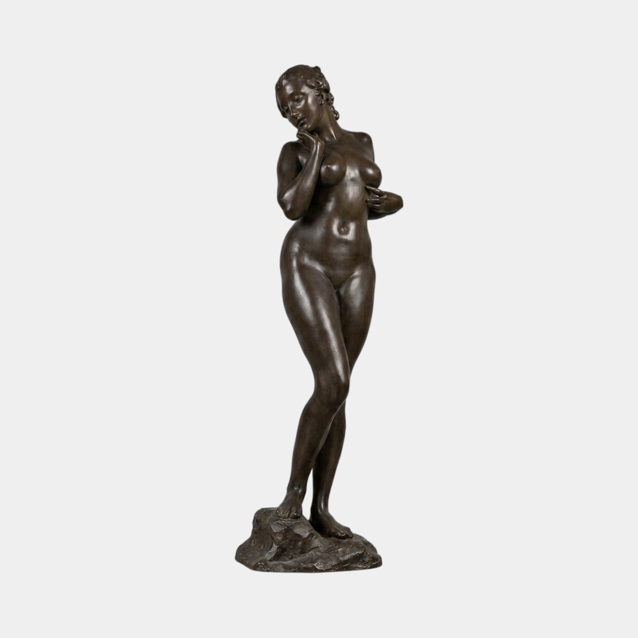 Large Classical Standing Nude Female Figure Bronze Sculpture by Giant Sculptures, 220cm dark patina figure in contrapposto with hands at chest, on rocky base.