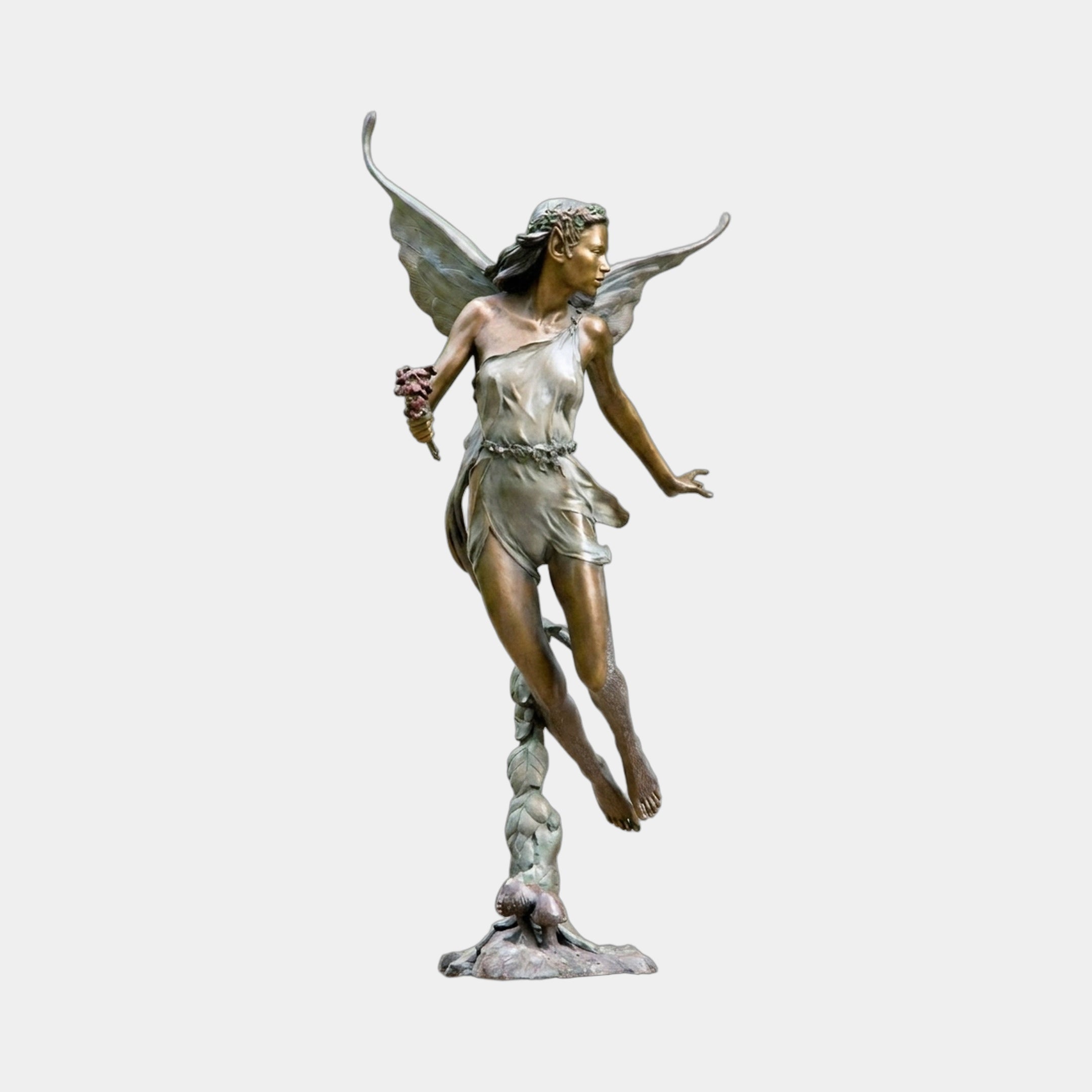 Large Classical Winged Fairy Figure Bronze Sculpture by Giant Sculptures, 150cm, poised on tiptoe with bouquet and outstretched wings on a plain background.