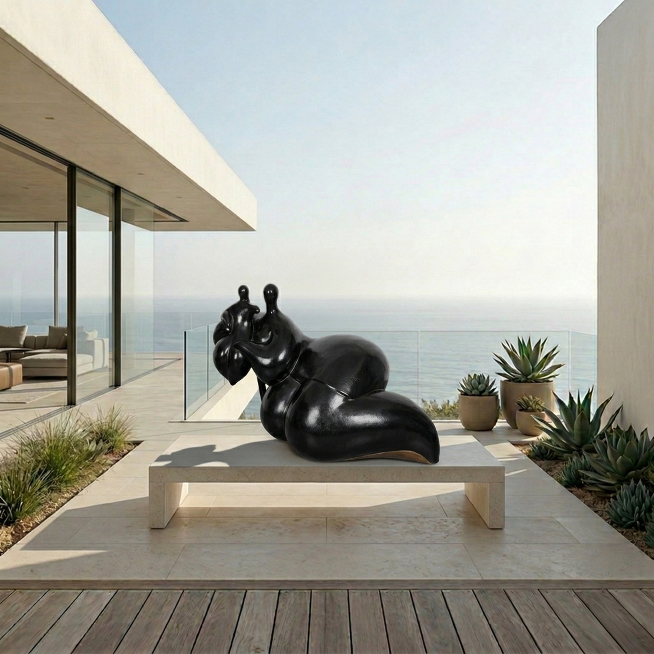 Giant Sculptures' 120cm Large Contemporary Abstract Reclining Figure Bronze Sculpture in black patina on a stone plinth, displayed on a modern oceanview terrace.