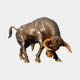 Large Contemporary Charging Bull Bronze Sculpture by Giant Sculptures, head lowered with golden-amber horns and dark brown patina, shown on a plain background.