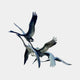Large Contemporary Flying Cranes Bronze Sculpture by Giant Sculptures, a flock of long-necked birds with outstretched wings caught mid-flight, dark patina finish.