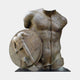 Large Contemporary Fragmentary Warrior Torso Bronze Sculpture by Giant Sculptures, headless male torso with circular relief shield, brown-green patina, on plain background.