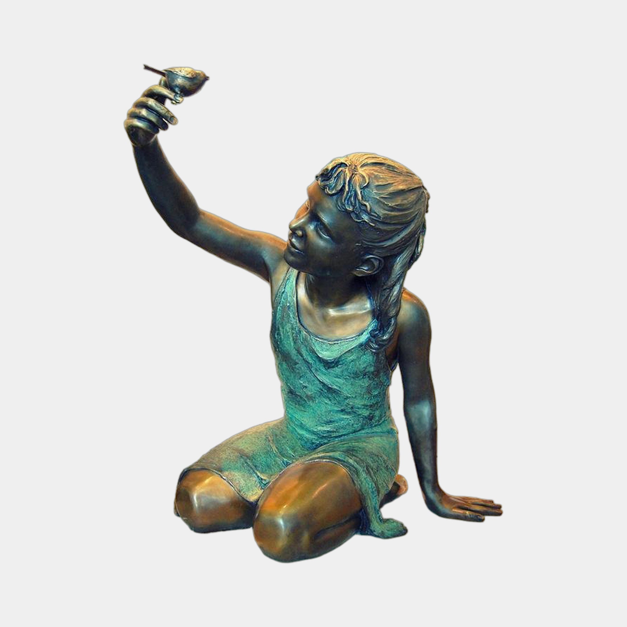Giant Sculptures' Large Contemporary Girl with Bird Bronze Sculpture, 130cm, kneeling girl lifting a small bird, verdigris and golden patina, plain background.
