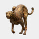 Large Contemporary Stalking Cheetah Bronze Sculpture by Giant Sculptures in a crouched stance with golden-bronze patina and black spots, on a plain background.