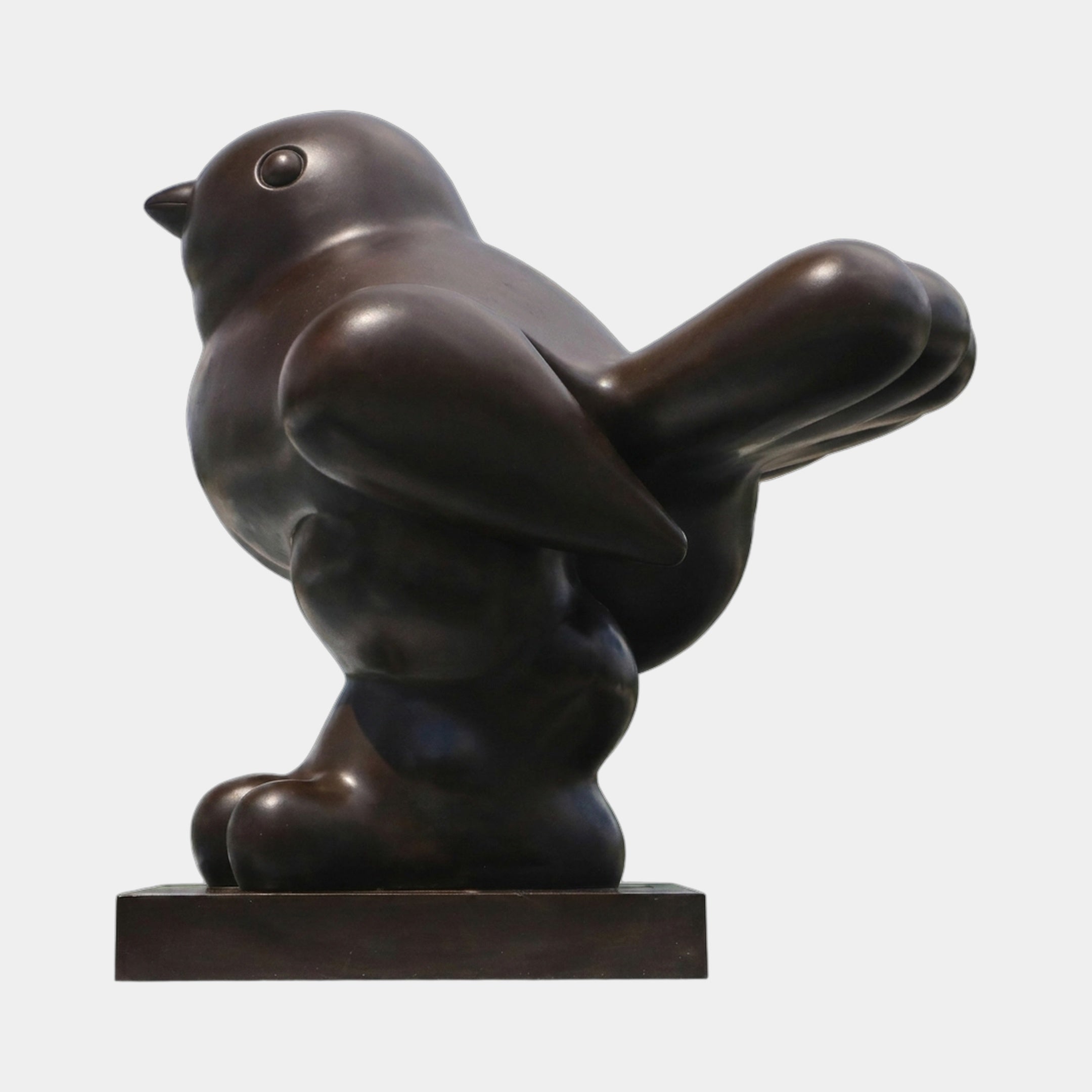 Large Contemporary Volumetric Bird Bronze Sculpture by Giant Sculptures, a rounded stylised bird with dark patina on a low rectangular plinth, shown side-on.