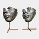 Giant Sculptures' Large Modern Abstract Face Fragment Bronze Sculpture 180cm, two cropped faces with frogs atop, facing each other on steel pole bases.
