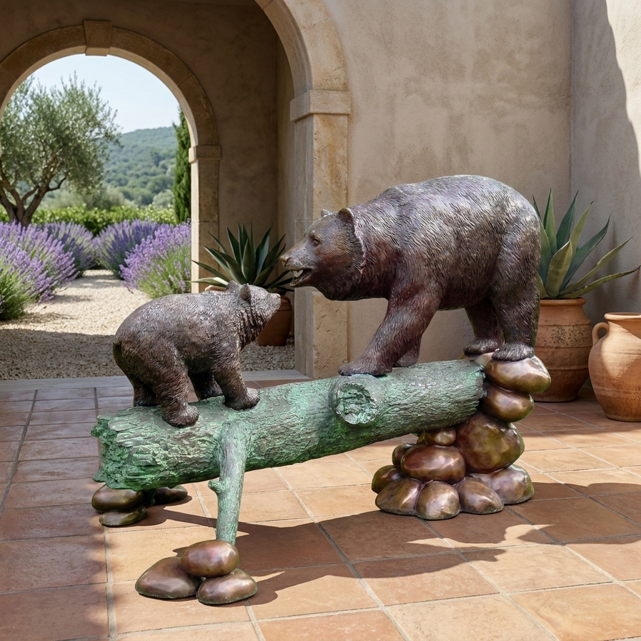 Large Traditional Bear and Cub Bronze Sculpture by Giant Sculptures on a tiled terrace, adult bear and cub facing across a verdigris log on river stones.