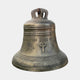 Large Traditional Church Bell Bronze Sculpture by Giant Sculptures, 120cm tall with Latin inscription, raised cross relief, and aged patina on a plain background.