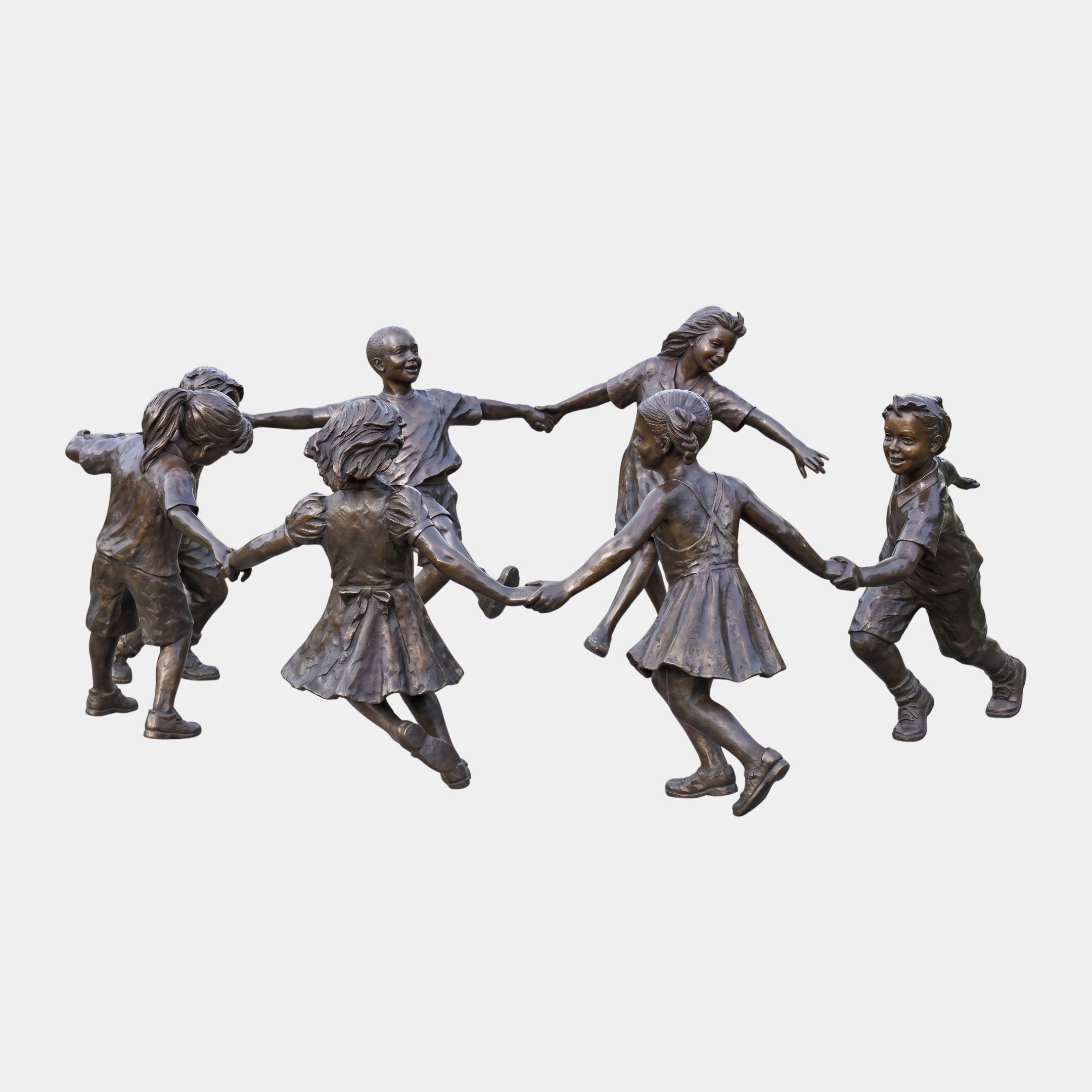 Large Traditional Dancing Children Bronze Sculpture by Giant Sculptures, 150cm, showing seven children in a ring holding hands with a warm mid-brown patina.